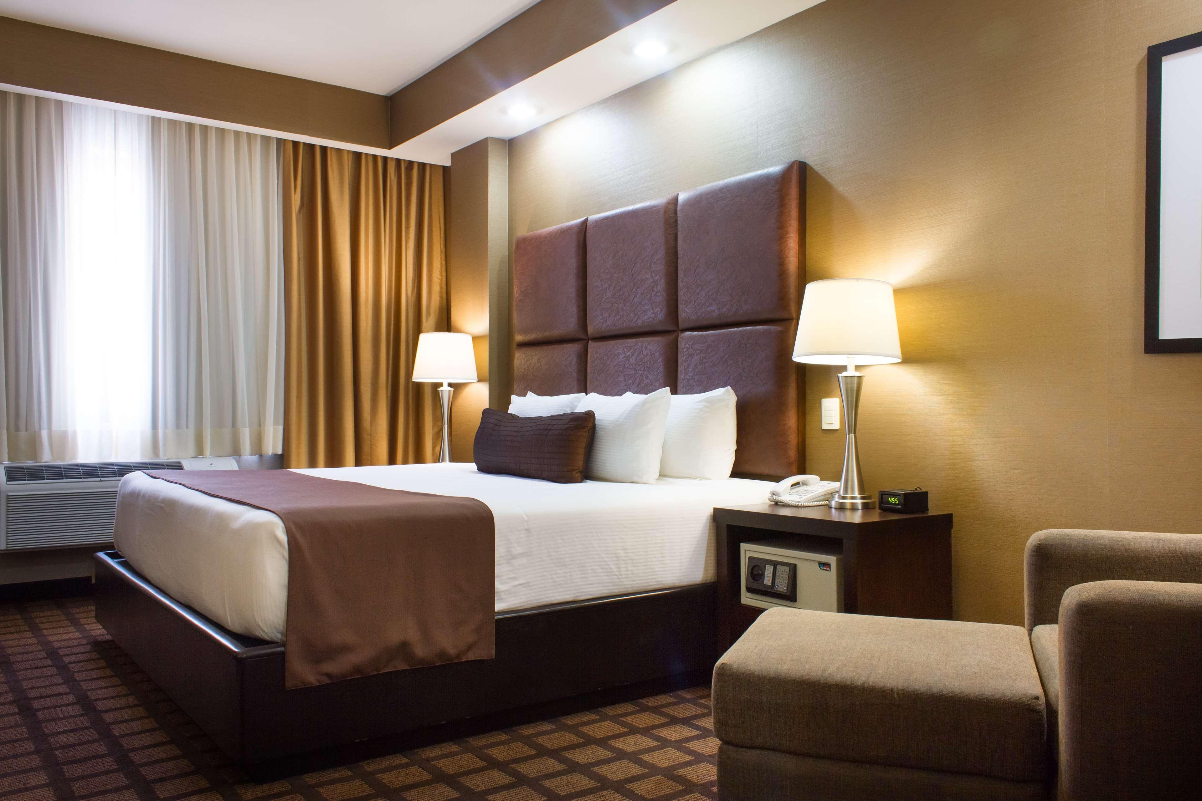 Best Western Premier Monterrey Aeropuerto Аподака Экстерьер фото A typical hotel room